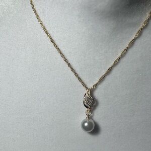 Elegant Gold and Silver Pearl Pendant Necklace